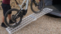 Bike being loaded into a van using a ramp