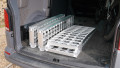 extra wide motorbike loading ramps folded up and stored in boot