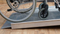wheelchair ramp with wheelchair being loaded