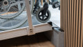 Wheelchair ramp with handrails, close up of rest on connection with a wheelchair going up onto a step