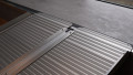 Aluminium wheelchair ramp with anti-slip surface 