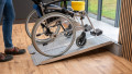 economy folding ramp resting on step with wheelchair being loaded