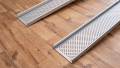 folding wheelchair ramps resting on the ground