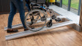 Low Profile Edge Channel Ramps resting on a step used with a wheelchair or mobility scooter being pushed up