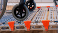 Close up manual wheelchair on a portable rollable aluminium wheelchair ramp