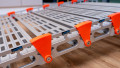 Close up of surface on a step of a portable rollable aluminium wheelchair ramp