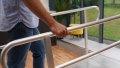Wheelchair ramp with handrails