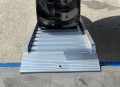 ramp resting onto van 