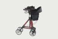 Folded red rollator