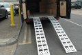 Pair of aluminium loading ramps on van 