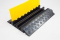 Black and yellow heavy duty cable protector 