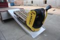 Pallet truck on heavy duty truck ramp 