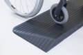 Wheel on rubber threshold ramp 