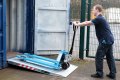 Pallet truck ramp loading into container