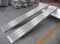 Pair of milled surface ramps for steel tracks 