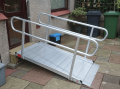 Wheelchair ramp with handrails in place