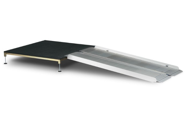 Wheelchair ramp resting on platform