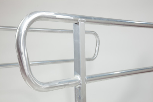 Handrail for wheelchair ramp
