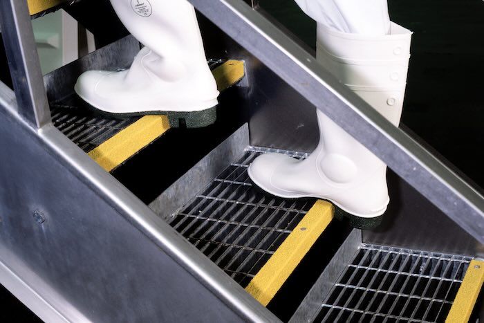 Person walking on anti-slip stair noising 
