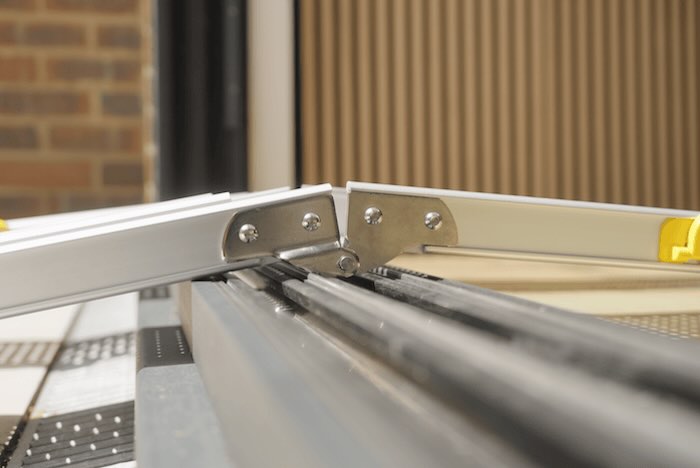 Telescopic wheelchair ramps briding uPvc doorway