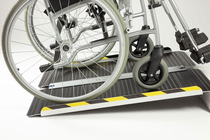 Wheelchair ramp Wheelchair going up black wheelchair ramp