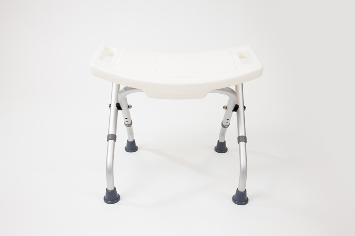 White folding shower stool with curved feet 