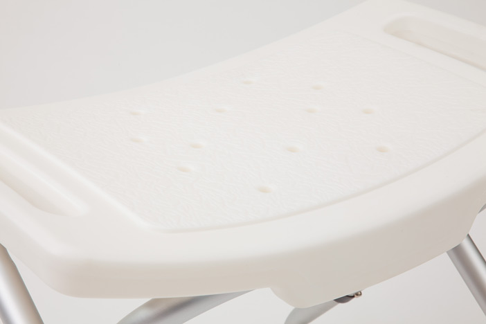 Shower stool with curved seat 