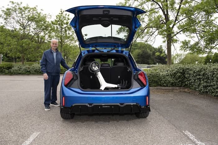 Folded Rollator stored in car boot Folded Rollator stored in car boot