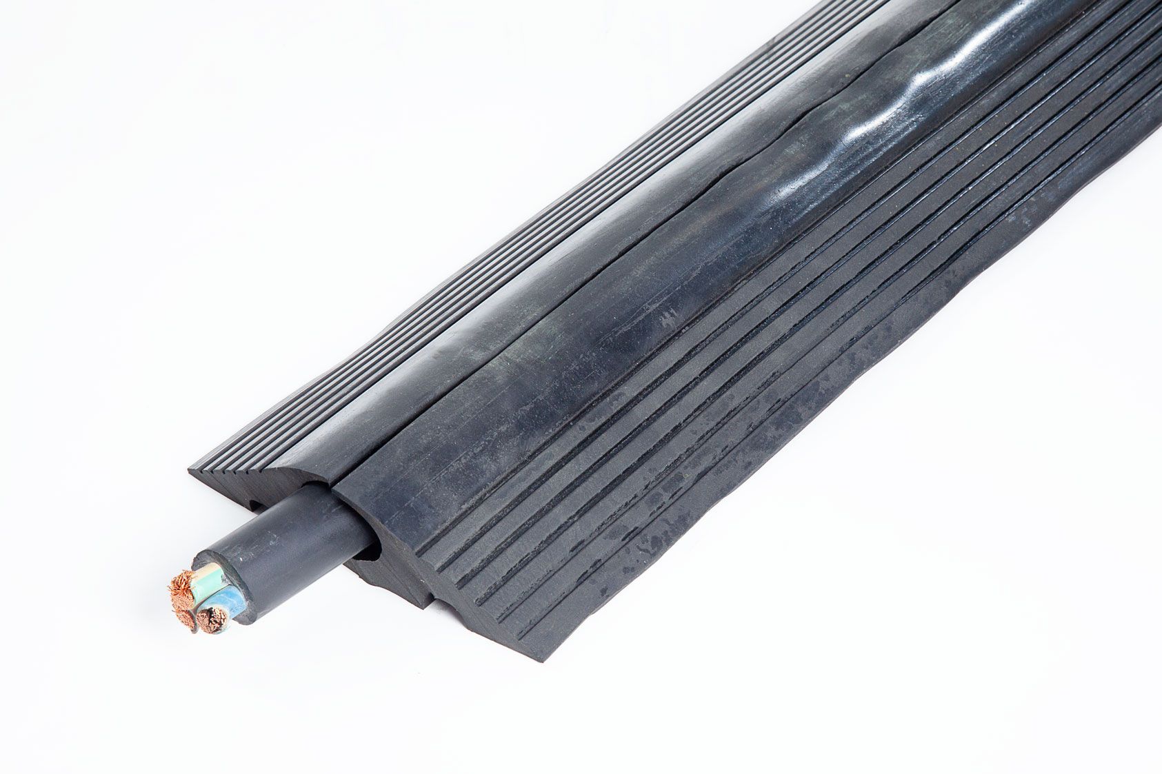 Black Floor cable protector with cable passing through 