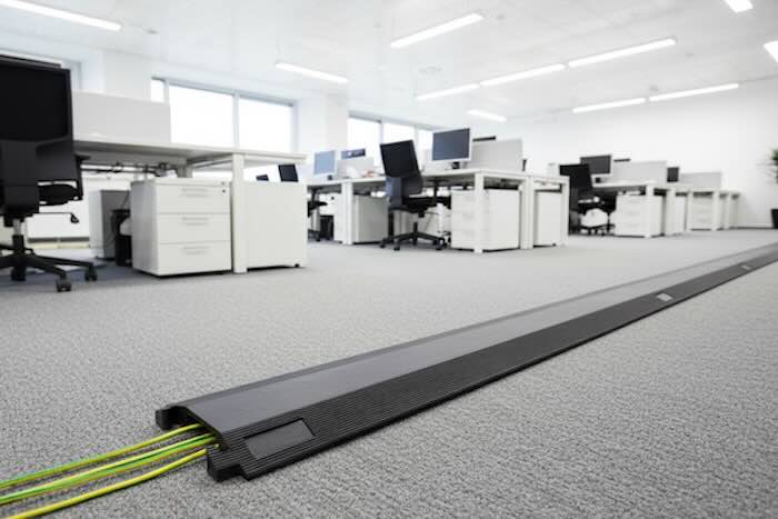 Black cable cover in office Black cable cover in office