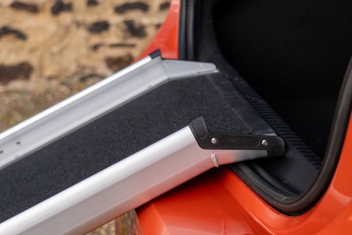 Dog ramp resting on car 