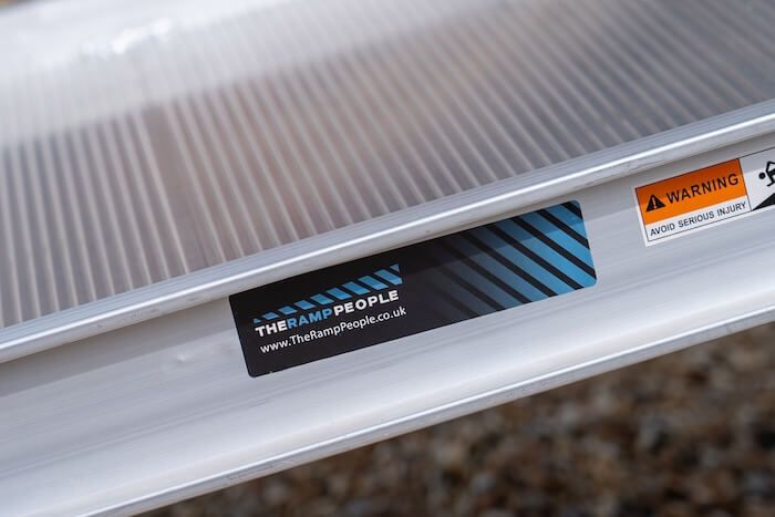 Van ramp with safety edges