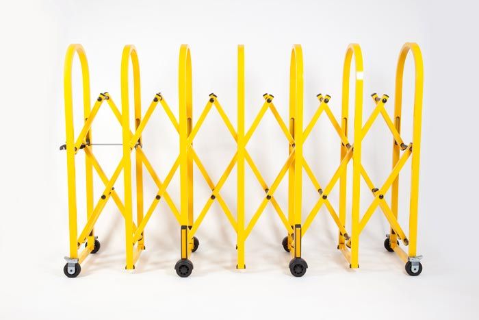 Yellow heavy duty expandable safety barrier on wheels Yellow heavy duty expandable safety barrier on wheels