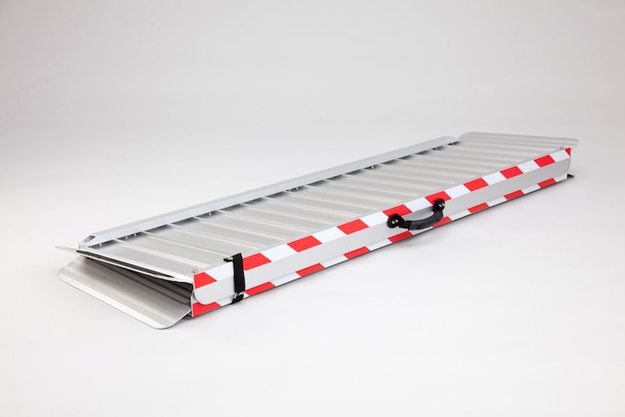 Folded wheelchair ramp with handle