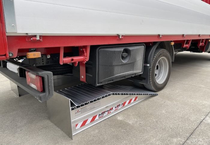 Pair of aluminium wheel risers in loading bay Pair of aluminium wheel risers in loading bay