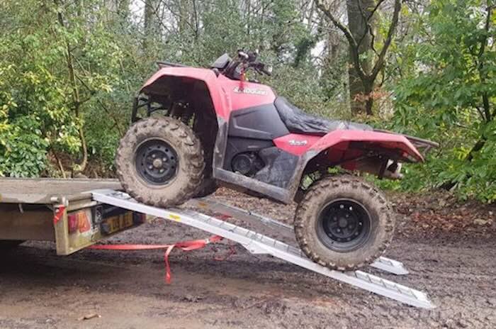 quad bike going up a ramp