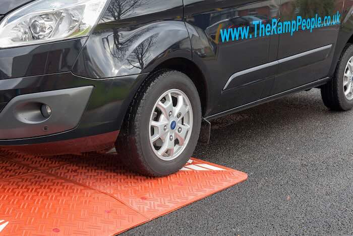 Red speed cushion with van passing over Red speed cushion with van passing over