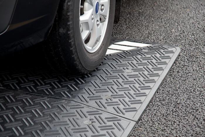 Black speed cushion with van passing over Black speed cushion with van passing over