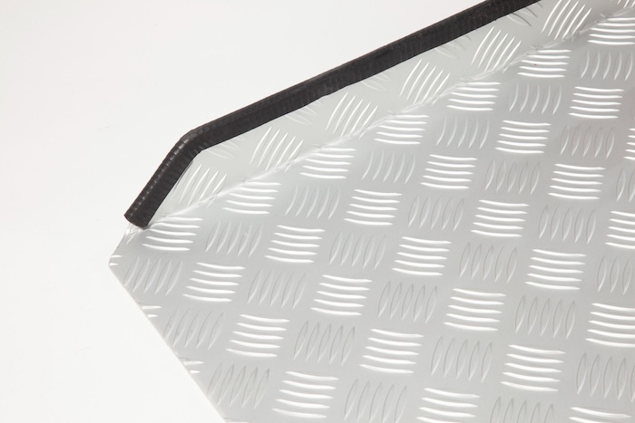 Wheelchair ramp with chequered anti-slip surface