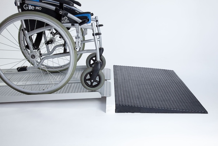 Wheelchair bridge ramp system Wheelchair bridge ramp system