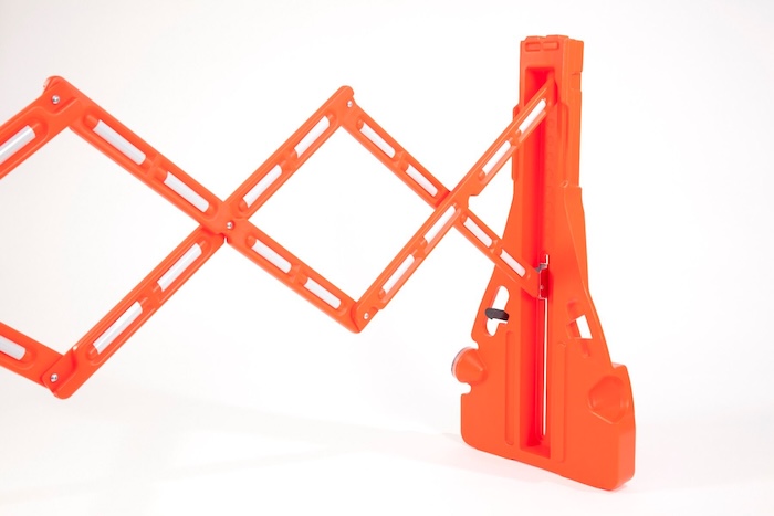 Extendable safety barrier with reflective tape