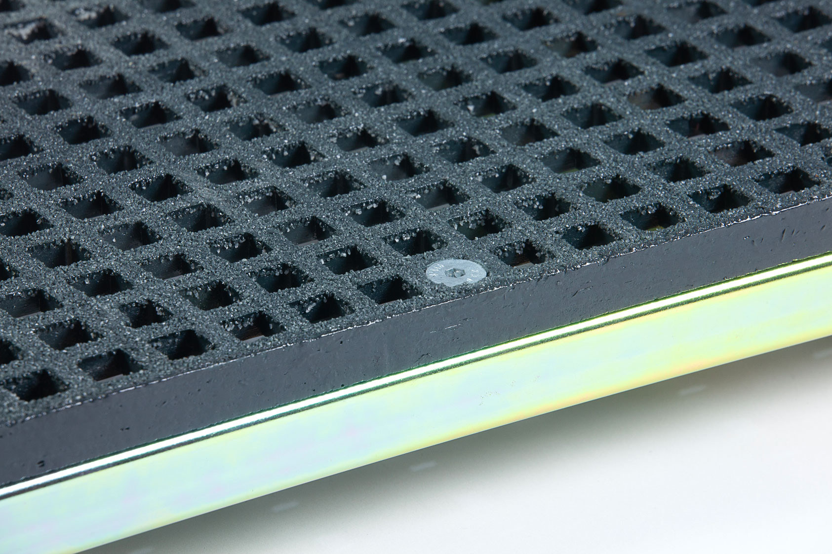 Outdoor half step featuring a self-draining anti-slip surface.