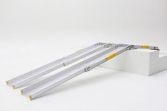 Pair of aluminium wheelchair ramps overcoming step