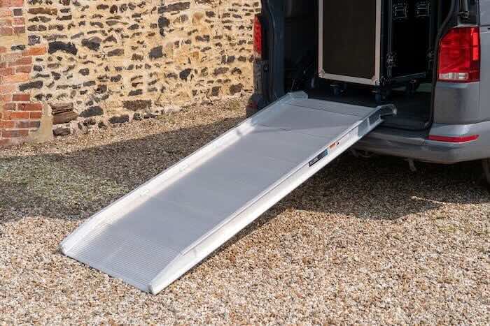 Aluminium van ramp resting on van 